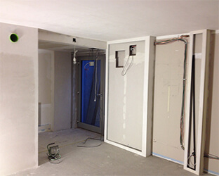 A special wall compartment for the sliding door to darken the room